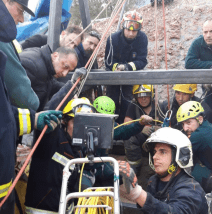 Mining rescue team reviews borehole footage