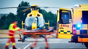 emergency helicopter transferring mine worker to hospital following roof bolter accident