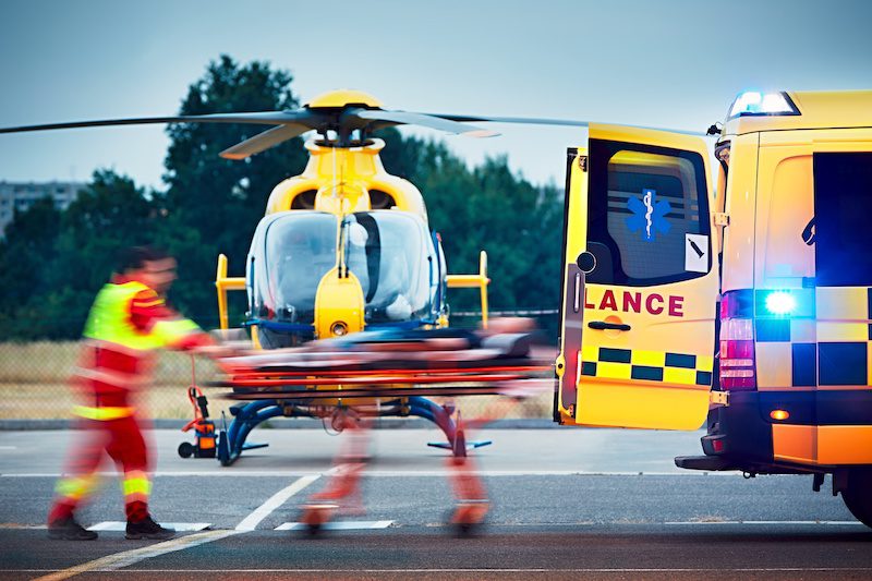 emergency helicopter transferring mine worker to hospital following roof bolter accident