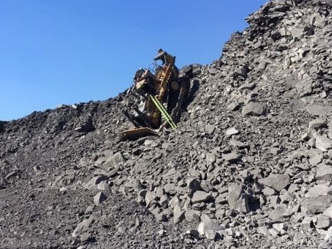 Dozer Operator averts disaster after going over an edge at night