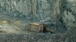 truck rolls from bench in quarry highlighting quarry safety concerns