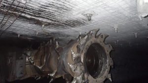continuous miner driver hit in face by nut from a roof bolt
