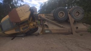 Inexperienced operator rolls dump truck